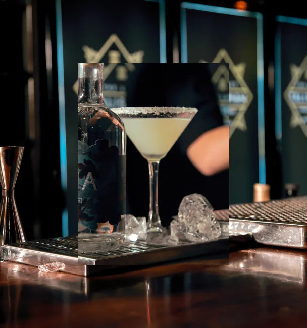 Axia Spirit Margarita Cocktail with another picture in the background of a bar