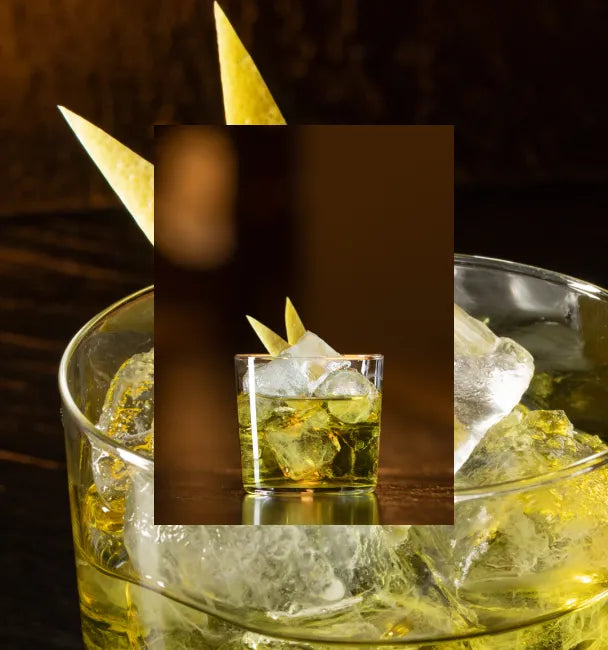 Axia Spirit White Negroni Cocktail on a brown background with another White Negroni picture in the background