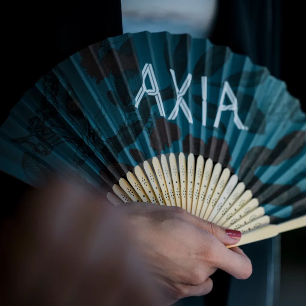 Axia Spirit Fan being held by someone