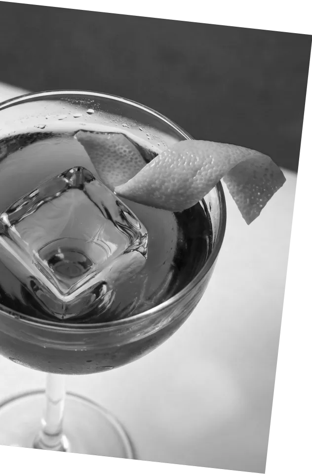 Black and white picture of an Axia Greek Mastiha Spirit Classic Cocktail with orange peel