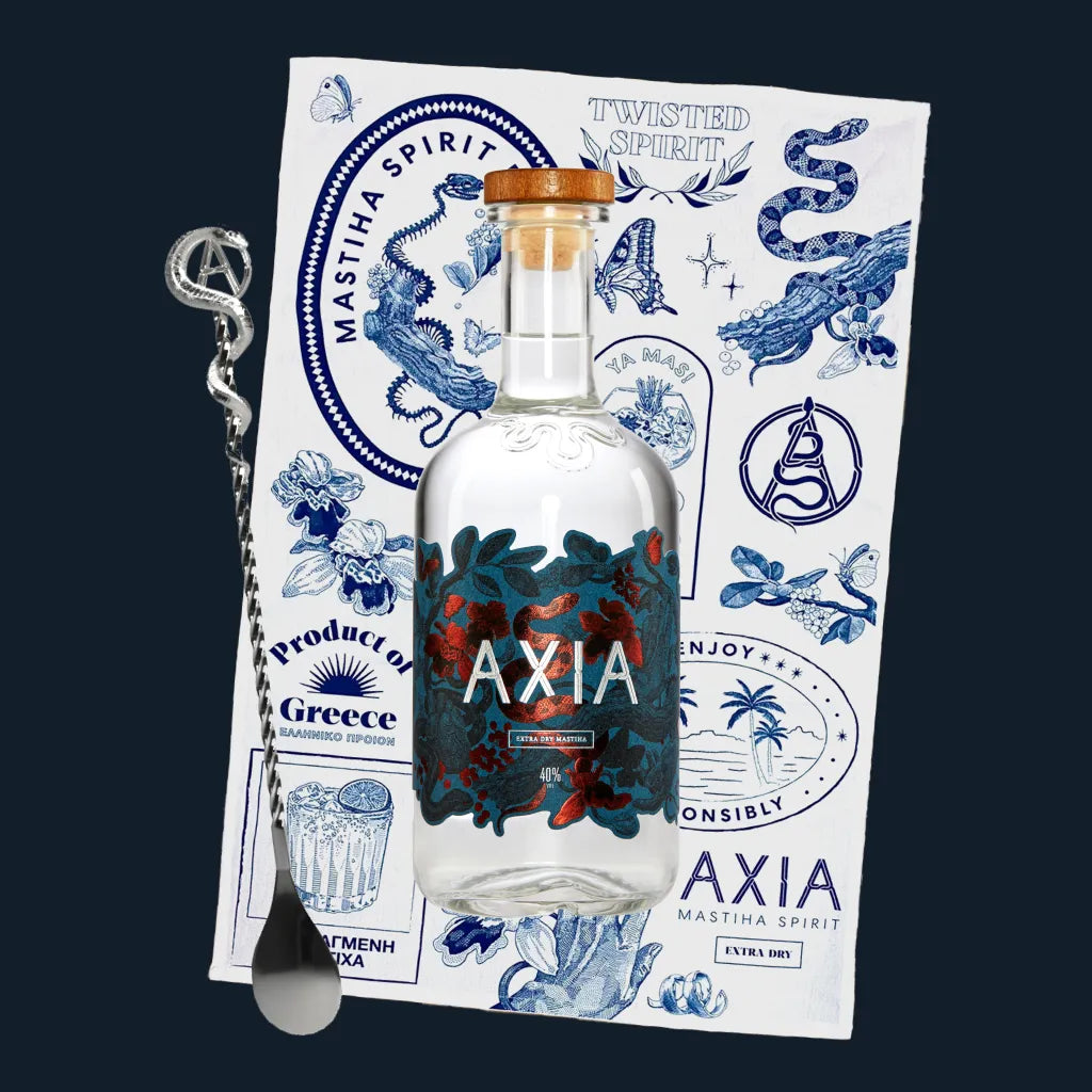 Axia Greek Mastiha Spirit Bundle with Mastiha Spirit, Cocktail Stirrer and Bar Towel on blue background