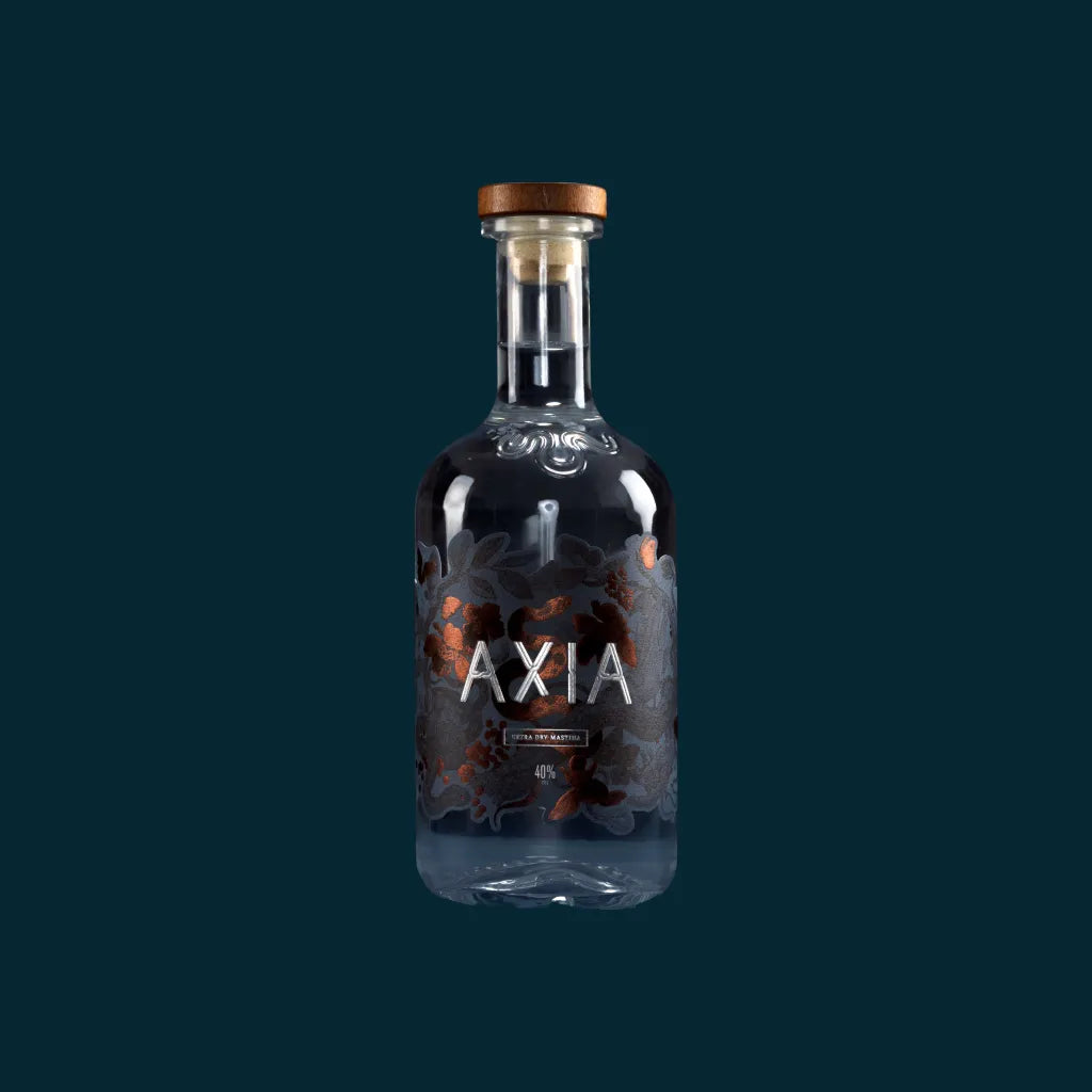 Axia Greek Mastiha Spirit bottle on a plain dark blue background