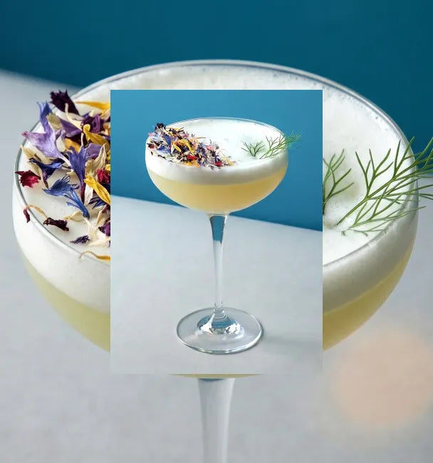Axia Greek Mastiha Spirit Sour Japanese Cocktail with flowers and dill on a blue background