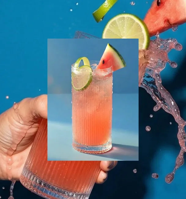 Picture of an Axia Greek Mastiha Spirit Watermelon Spritz Cocktail with a secondary picture in the background of another Axia Spritz cocktail being splashed out