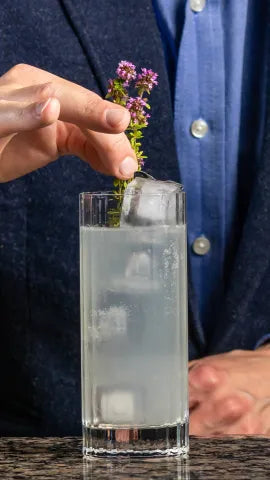 Axia Spirit and South Lodge Mediterranean Mule Cocktail on a bar for Salon Prive